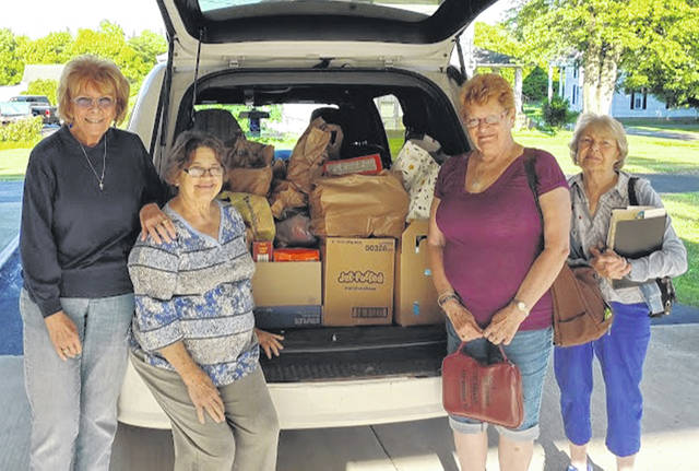 Many help with food drive, and celebrate Pastor Dan’s 40th year of ministry