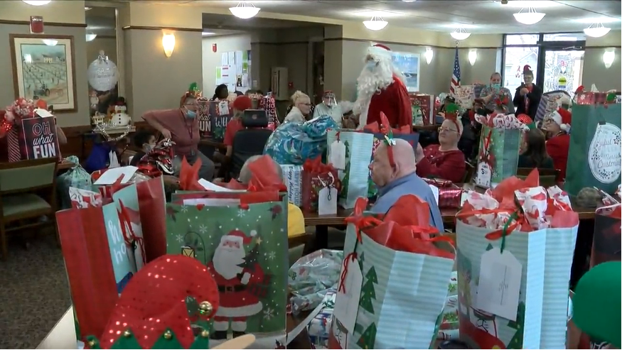 QC seniors get into holiday spirit with Christmas carols, gifts