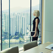business women looking out the window