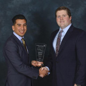 Hector winning an award