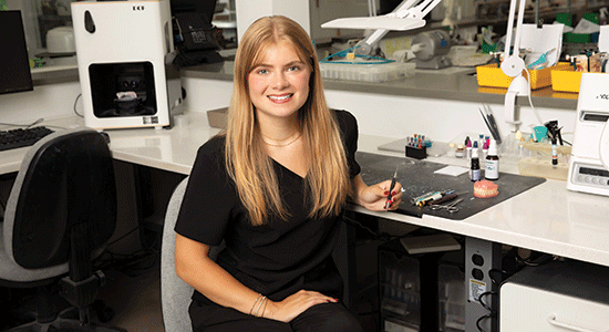 Modern Woodmen member Lila Ingold posing in a dental clinic.