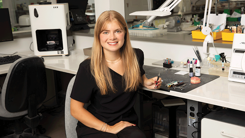 Modern Woodmen member Lila Ingold posing in a dental clinic.