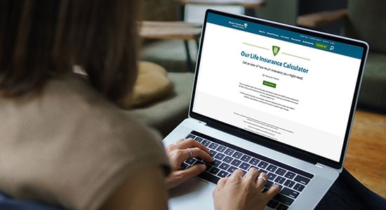 A computer screen with Modern Woodmen's life insurance calculator displayed.